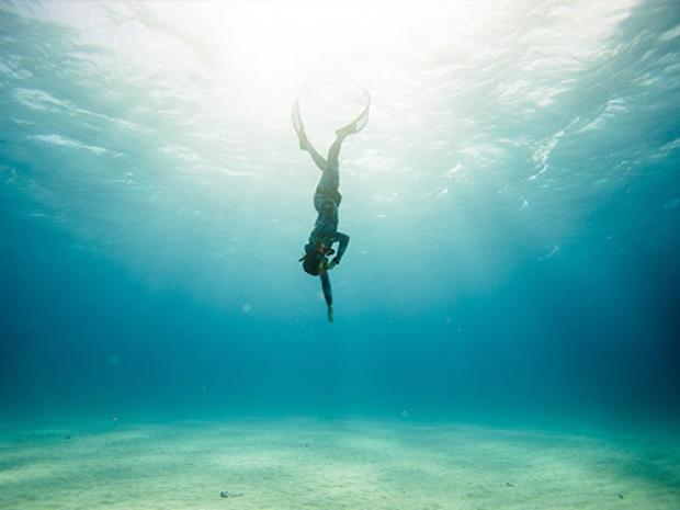 diver swimming underwater