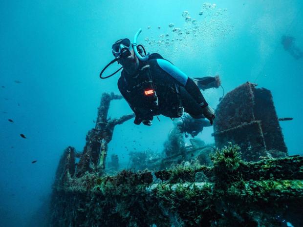 Diver exploring a shipwreck location