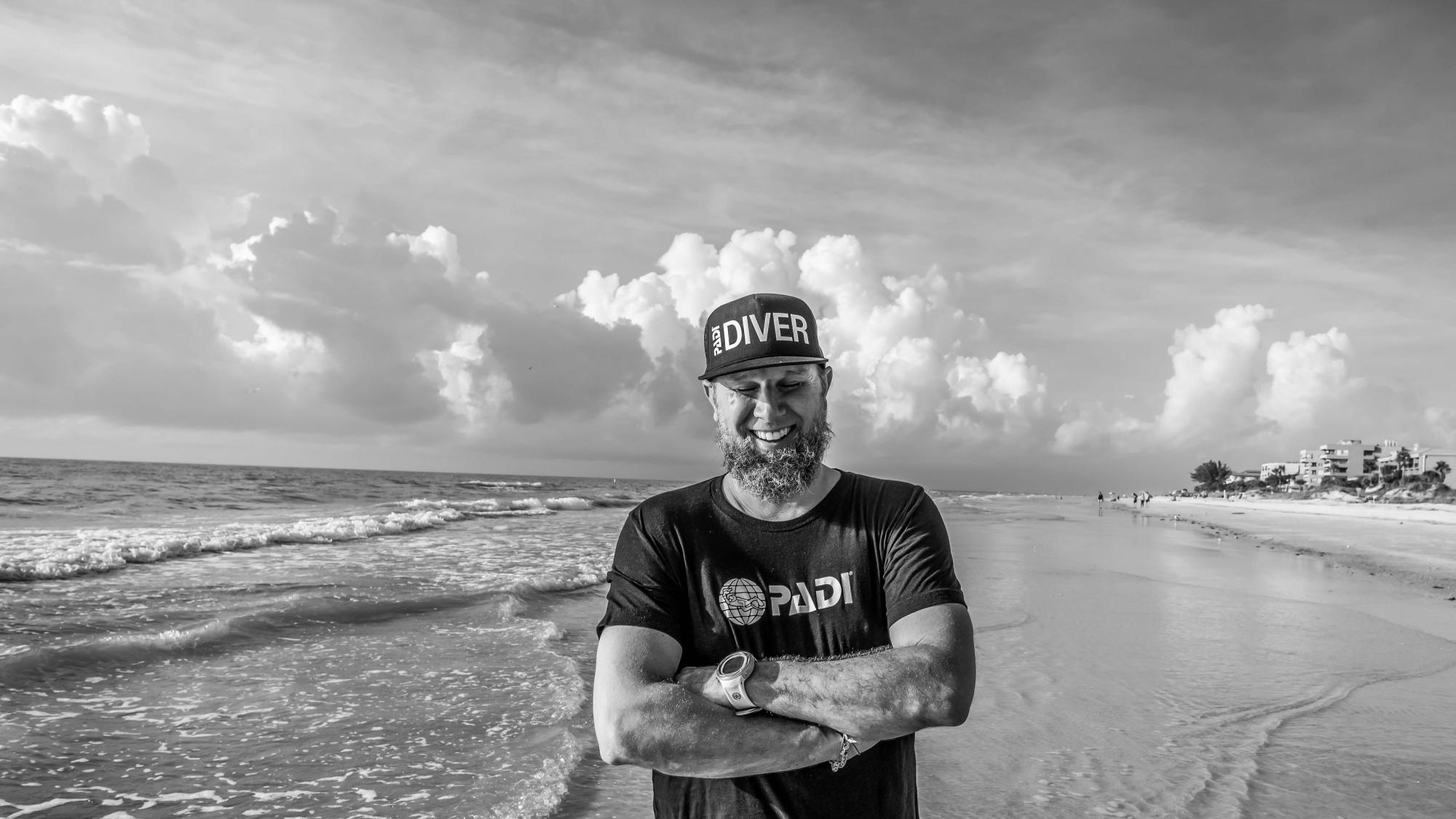 Thomas Koch smiling at the beach